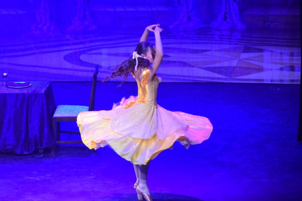 Belle from Beauty and the Beast twirling 