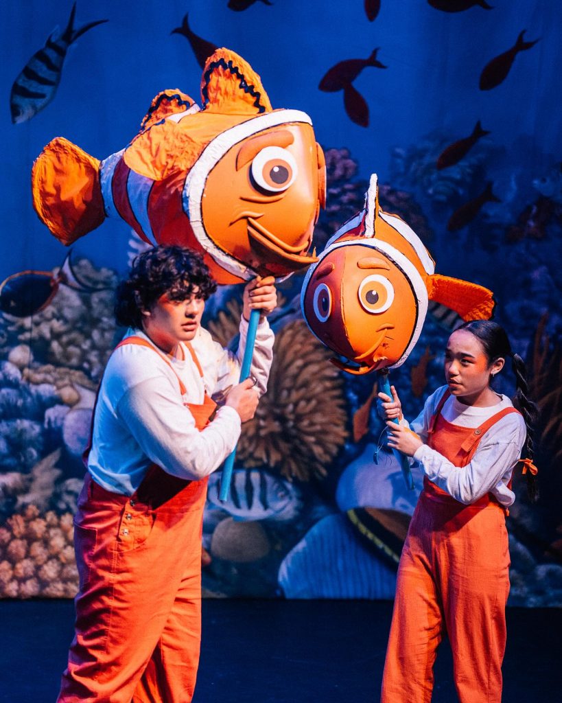 Marlin and Nemo with finding nemo puppets onstage