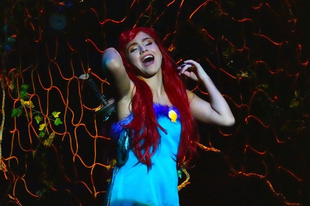 Ariel in her grotto singing part of your world 